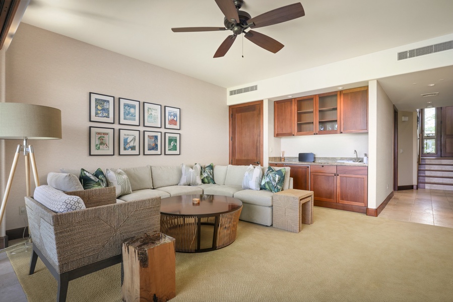 Lower level bonus “retreat” room w/wet bar, sofa set, flat screen television and lanai (deck).