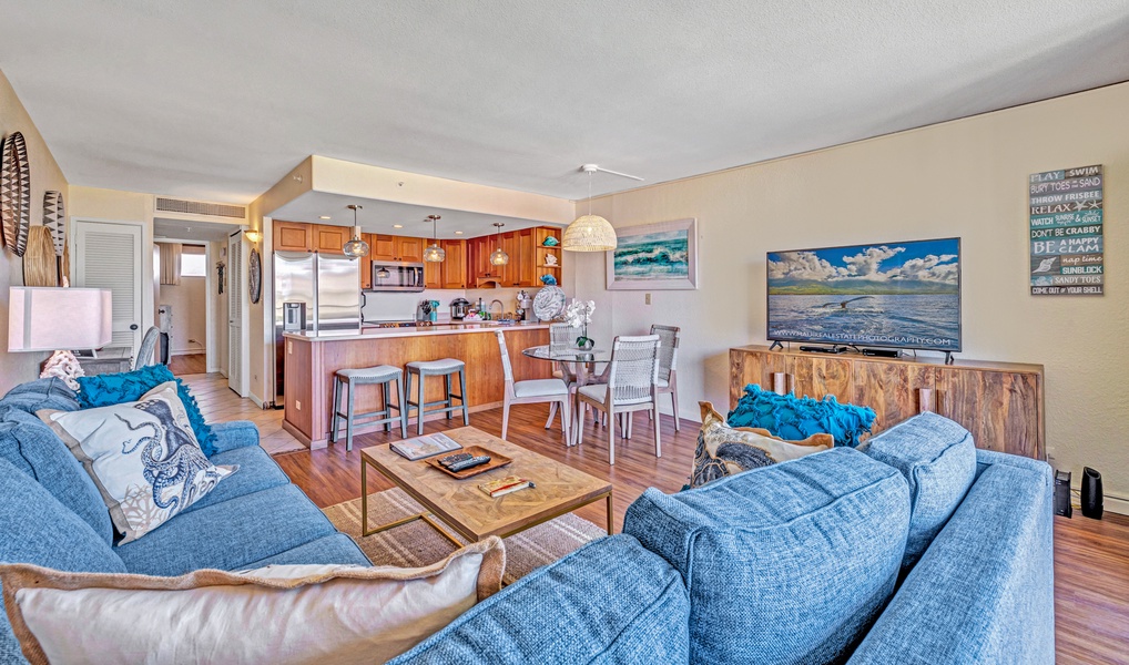 The open-concept living space at Kaanapali Shores 746 flows into the kitchen and dining for easy together time.