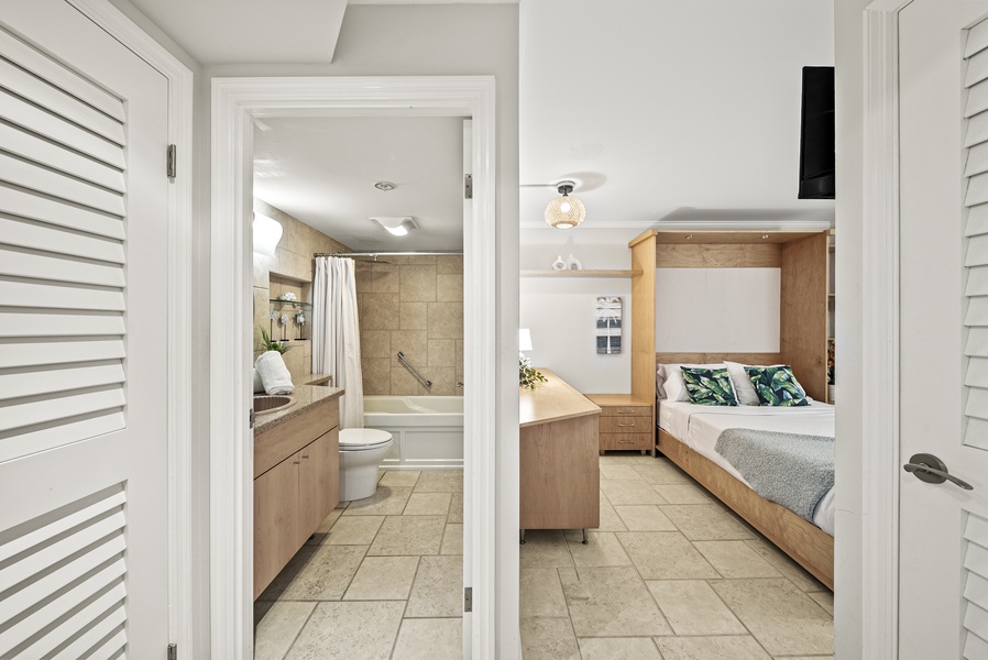 Enjoy seamless comfort with a thoughtfully designed layout connecting your second guest bedroom and bathroom for ultimate convenience.