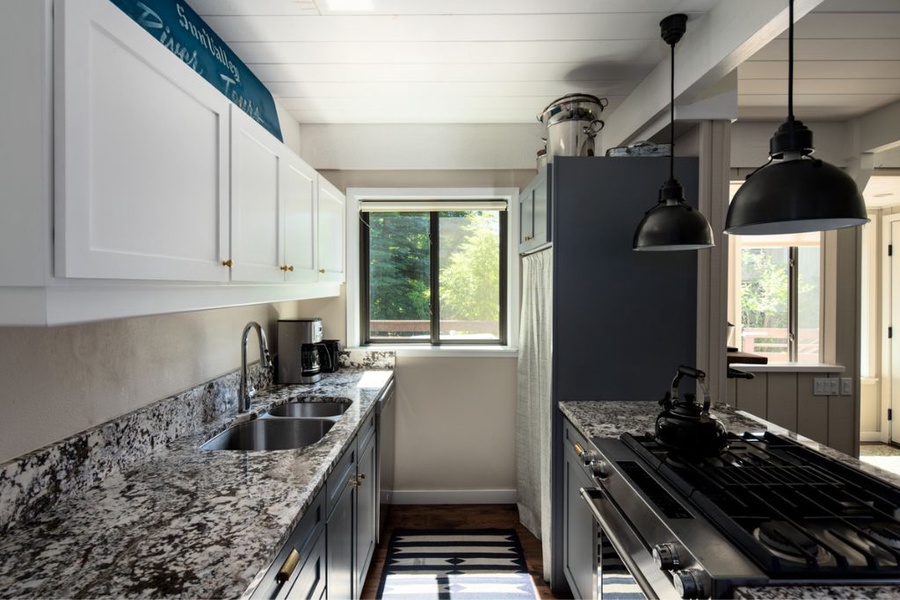 Spacious galley kitchen with wide counter spaces that make meals a breeze.