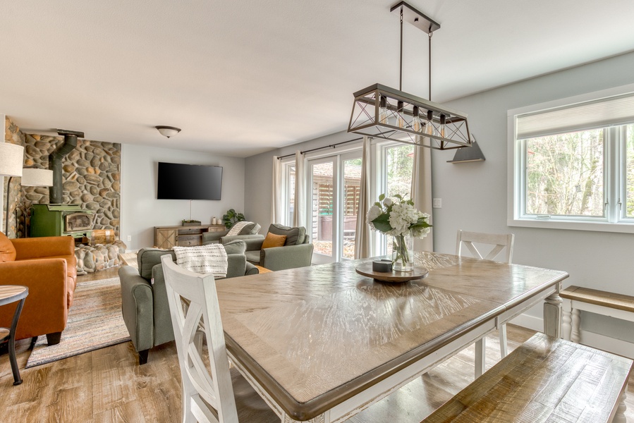 Gather around this large dining table for a meal or conversation, with open-plan living space that brings everyone together in comfort and style.