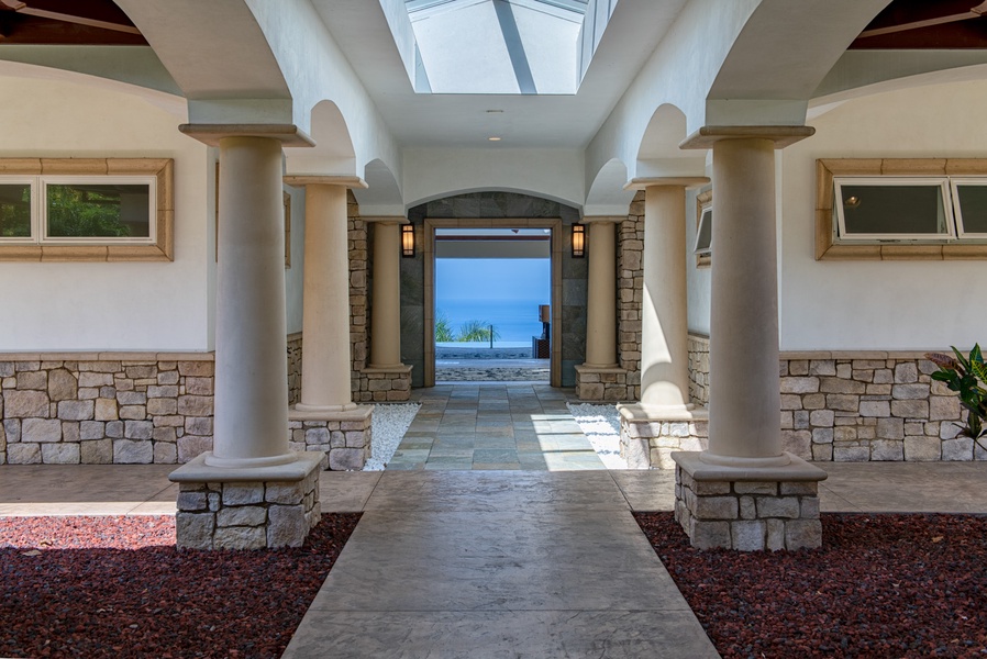 Walk down this hallway towards the pool and ocean views.