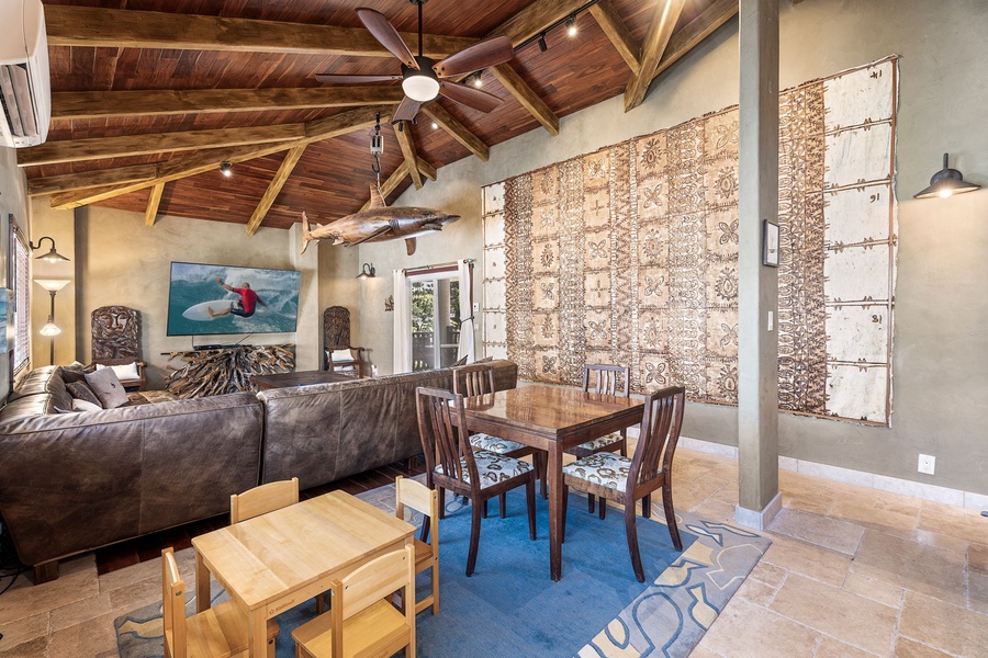 View of the home theater and entertainment area, complete with themed artwork and local accents.