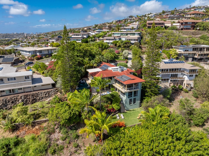 Kahala Hills Estate nestled on a private ridge, surrounded by lush greenery and privacy.