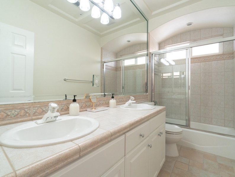 Experience the epitome of style and functionality in the common full bathroom at the first floor