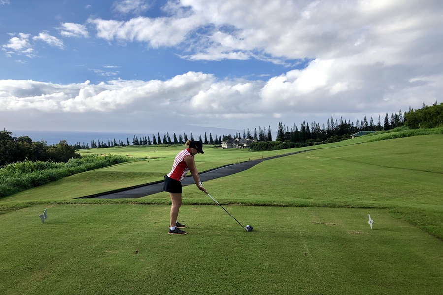 Tee off with panoramic views of Maui’s coast and rolling hills near Kapalua Ridge 2321.