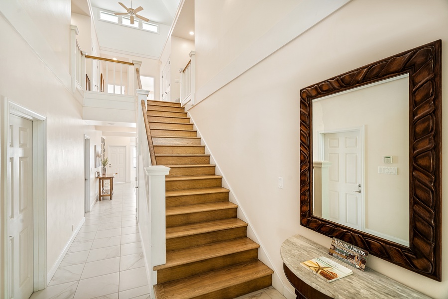 Grand stairway leading to the 4 upstairs bedrooms