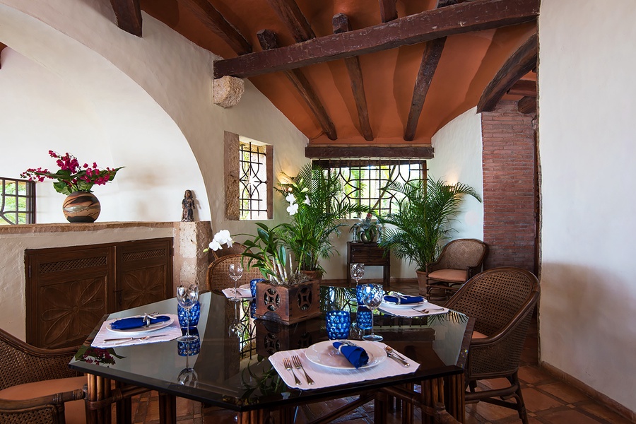 Charming rustic dining room features a table for four.