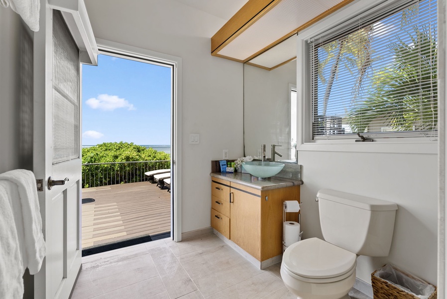 The shared guest bathroom conveniently located right off the deck.