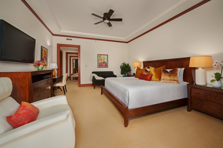 The Master Bedroom is Tastefully Decorated with Memory Top Plush Mattress, Top-quality Linens, Hardwood furnishings, Desk, iPod Dock, HD Television, CD/DVD Player, Walk-in Closet