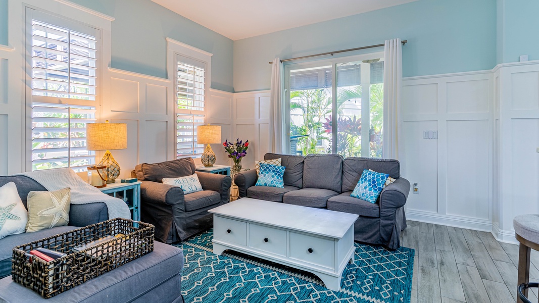 Sink into the plush seating in the living area surrounded by colors of the ocean..