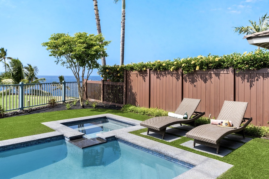 Relax poolside with multiple seating options under the island sun.