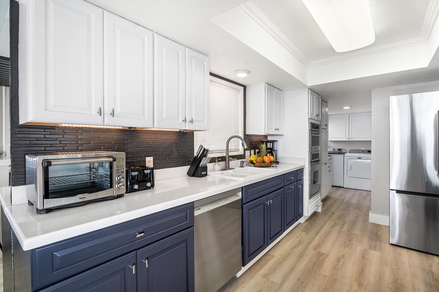 Fully equipped kitchen with modern appliances and plenty of storage for your stay.