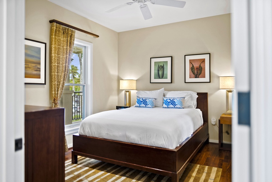 Queen bed in the 2nd guest bedroom and views of the Ocean