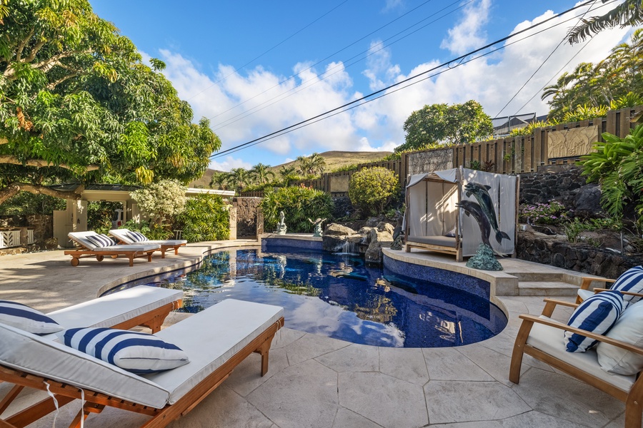 Relax on the chaise loungers poolside.