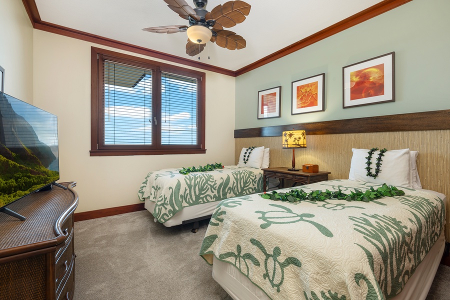 Drift off in your tropical-themed twin bedroom, where island-inspired linens and warm wood tones create your perfect Hawaiian retreat.