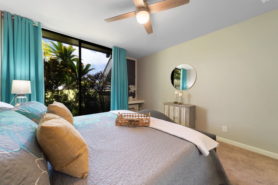 Take in the beauty of the lush, tropical greenery from the comfort of your bed