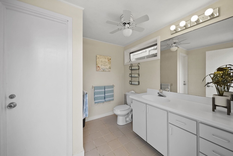 Convenient outdoor bathroom, perfect for rinsing off after a beach day or island adventure.