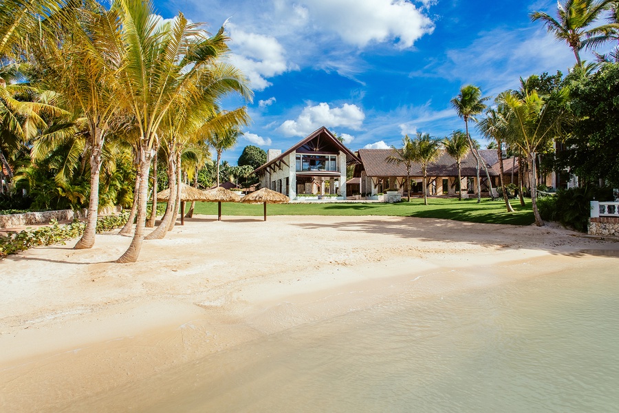 Beautiful beachfront property with lush surroundings.