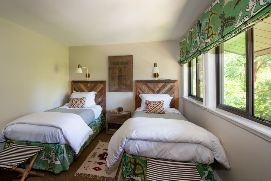 The guest bedroom with two twin beds, a perfect spot for the little ones.