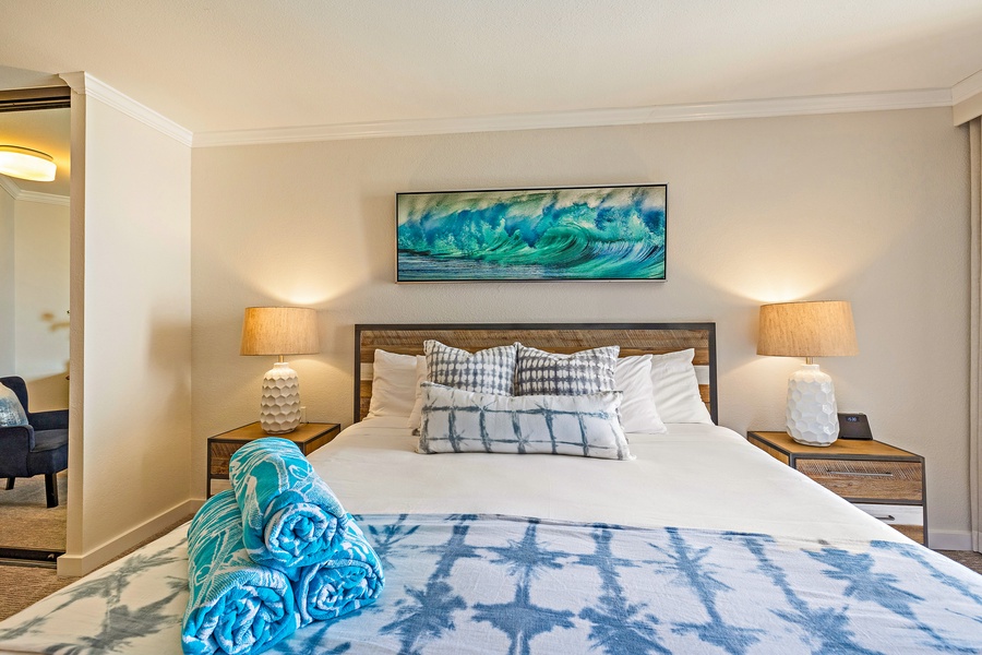 Rest easy on Kaanapali Shores 903’s plush king bed with vibrant island accents.