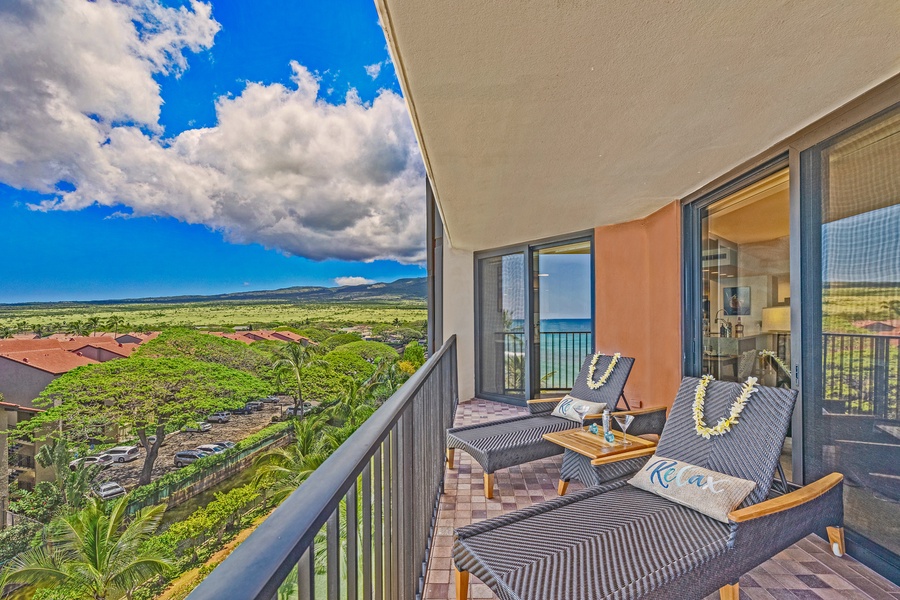 Relax on the private lanai and take in the stunning ocean and mountain views.