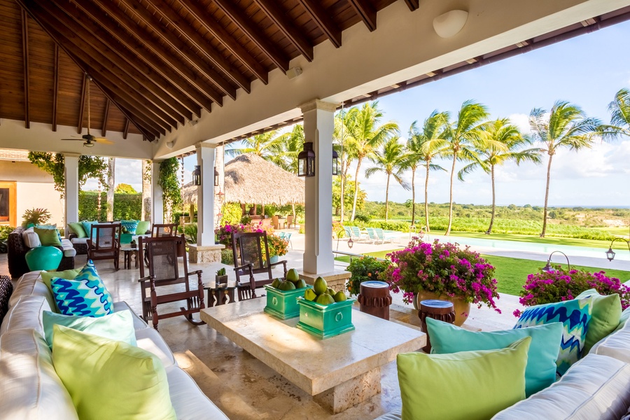 Cozy outdoor seating with garden views.
