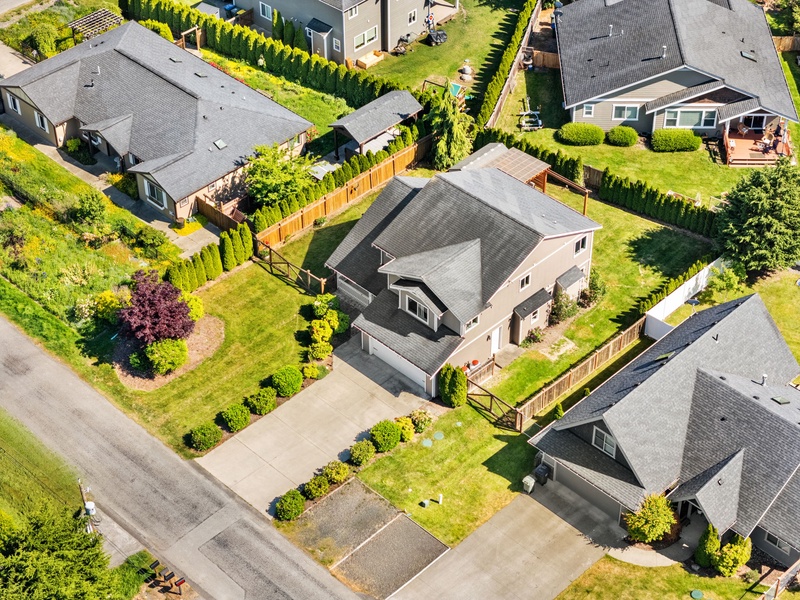 Aerial view of Blaine Breezes nestled within a peaceful residential neighborhood near the coast and Canadian border.
