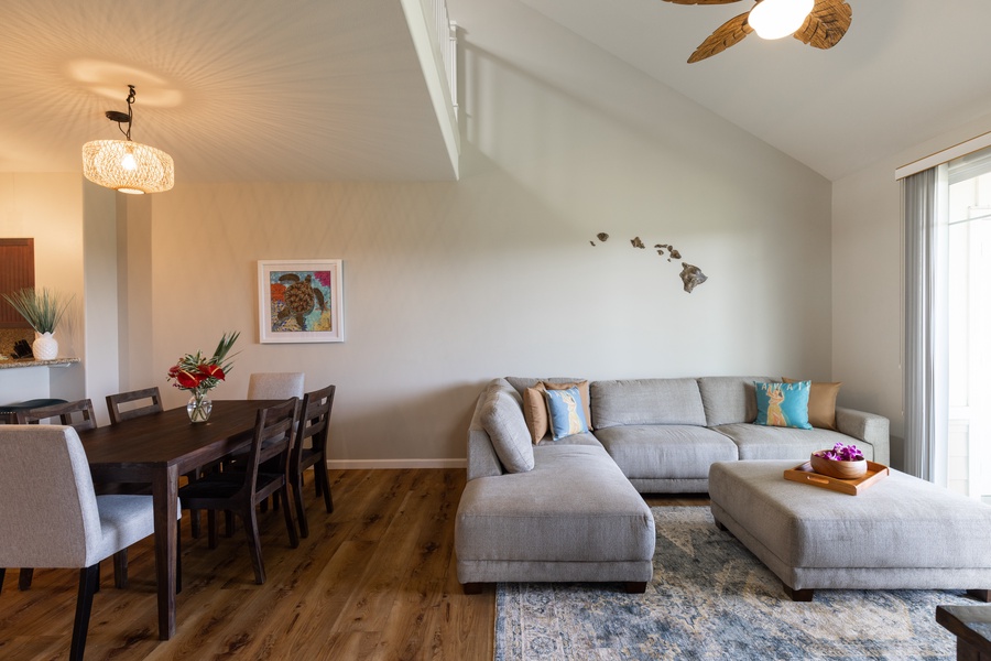 Comfy seating with vaulted ceilings and lots of space in the living room area