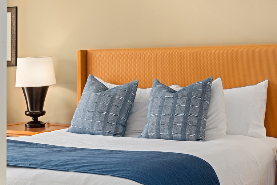 All bedrooms in Honua Kai Konea 230/232 feature plush pillows, neutral tones, and restful finishes