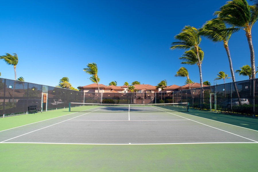Another angle of the on-site tennis courts—play a friendly match under clear skies and surrounded by resort beauty.