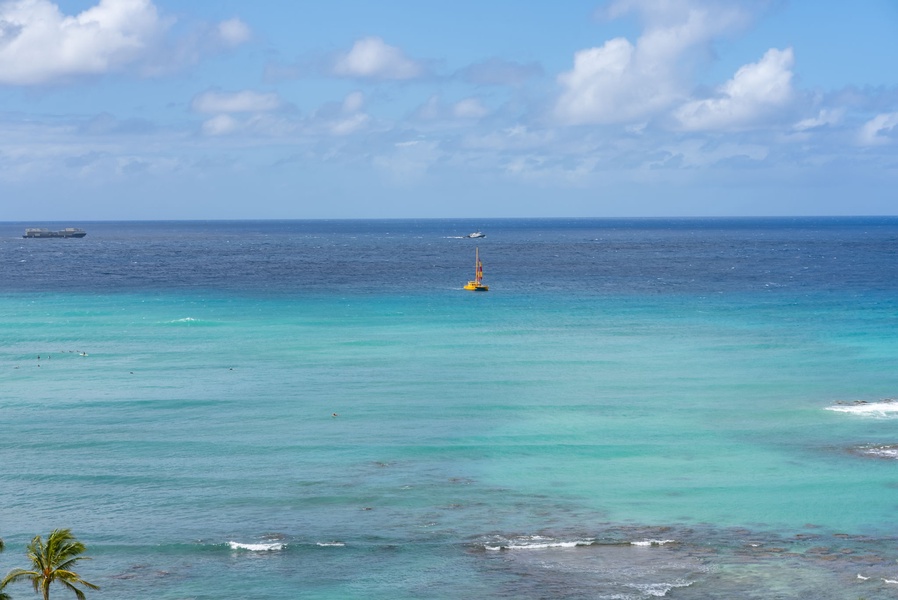 Vibrant turquoise waters stretching into the horizon—perfect for water activities or relaxing by the shore.