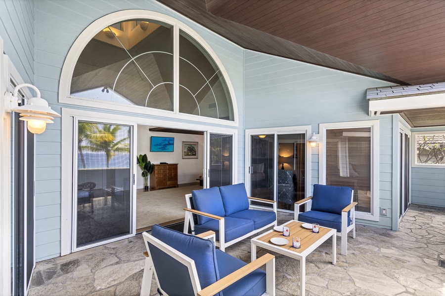 Covered seating just off the primary suite is perfect for morning coffee or reading.