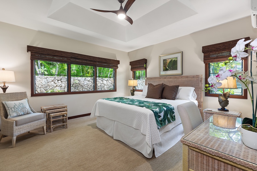 Tennis house bedroom with a king-size bed and stylish decor, creating a restful retreat.