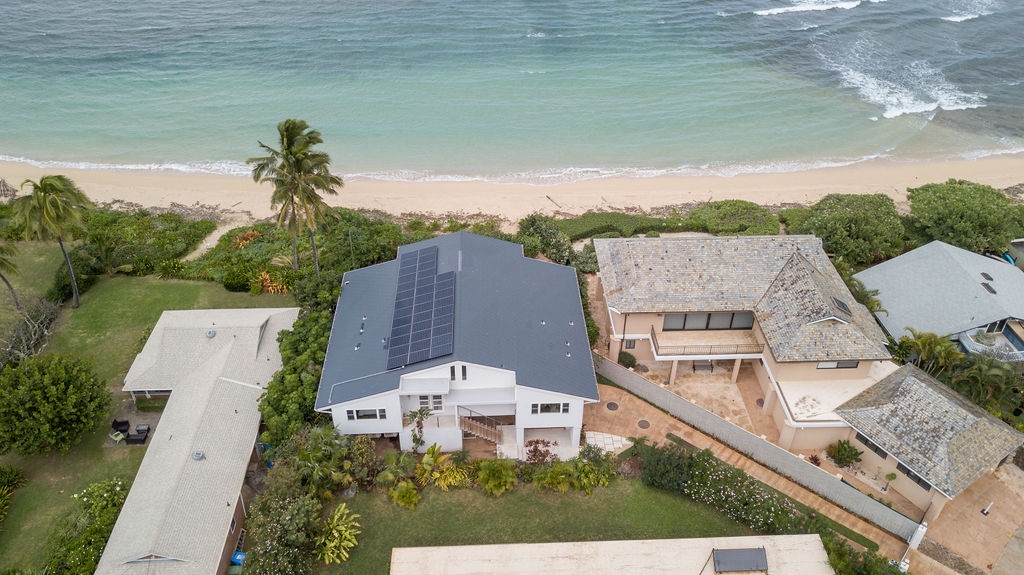 Aerial shot of property and surrounding neighborhood