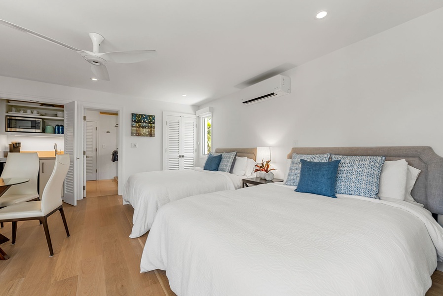 Relax with central A/C, ample lighting, and seating in this generously sized and thoughtfully furnished guest studio.