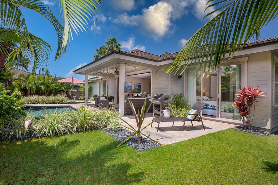 Outside, a private pool and gated backyard create an outdoor oasis for guests to enjoy quality vacation time together.