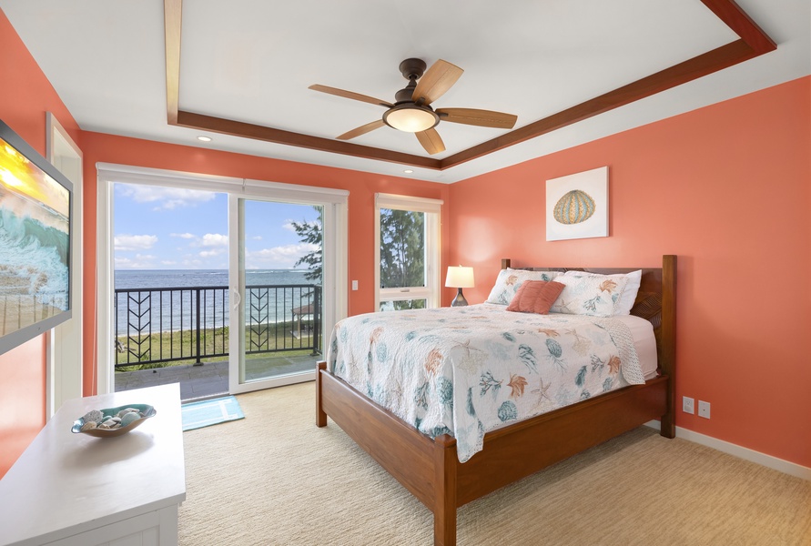 The third and fourth bedrooms, which share a Jack-and-Jill bathroom, each have a double bed, lanai with mountain views, television, and desk