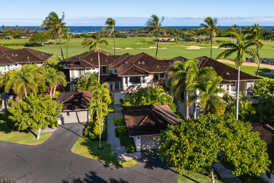 Your tropical villa awaits overlooking championship golf greens and ocean blues.