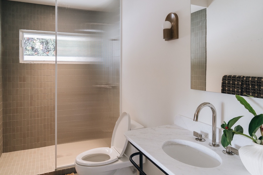 Clean lines and modern finishes create a bright, refreshing space to start and end your day.