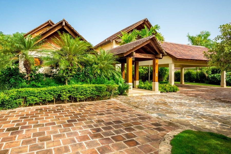 The stone-paved driveway leading to the entrance of this beautiful villa in Dominican Republic.