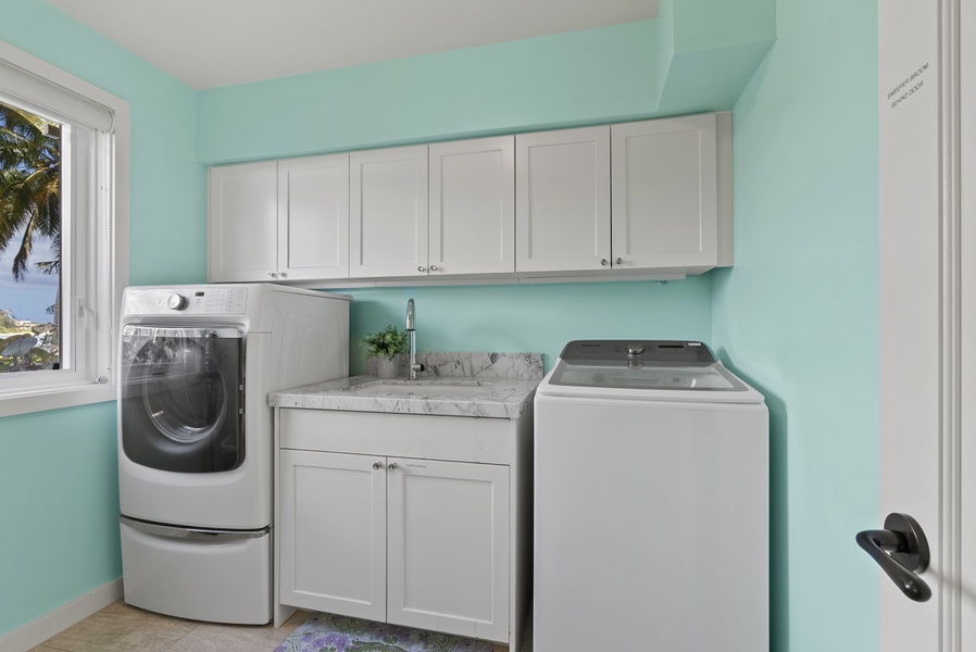 Full Laundry room with washer, dryer and sink