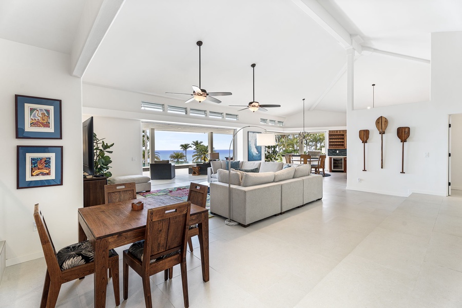 Indoor dining area flows seamlessly to the pool lanai, where resort-style ambiance meets everyday comfort in your private retreat.