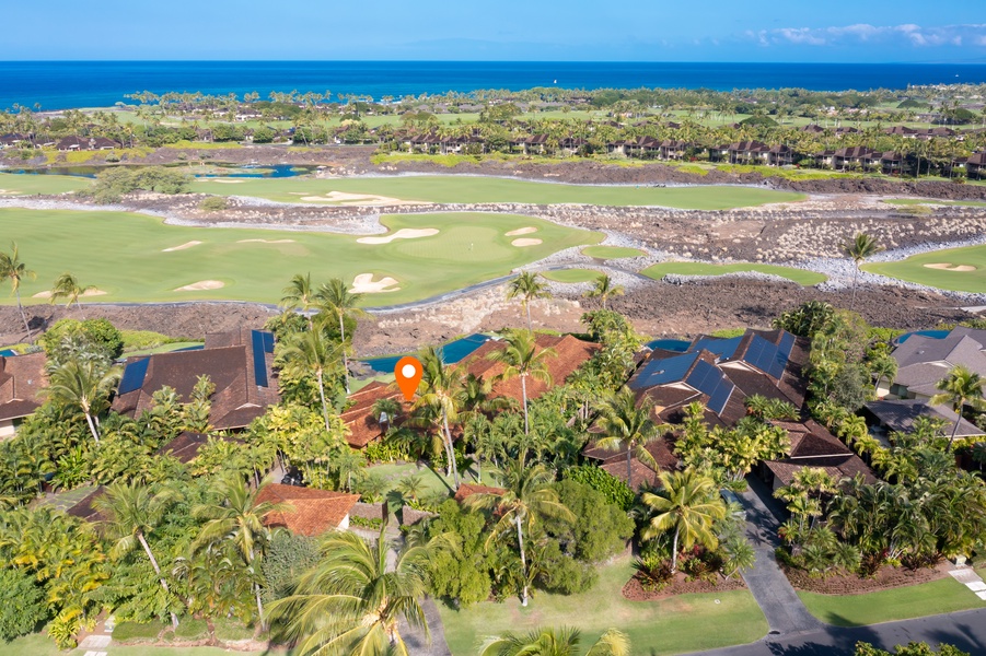Prime apex lot framed by tropical landscaping and golf course frontage.
