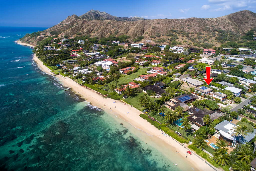 Aerial view of Diamond Head coastline with villa location marked—true beachfront luxury in Honolulu.