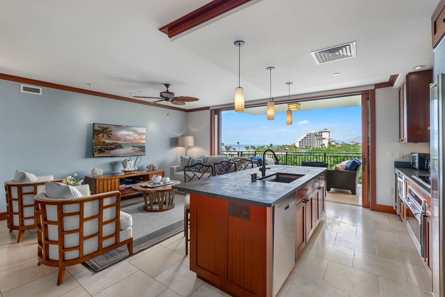 Enjoy preparing meals in your open kitchen while taking in stunning views through floor-to-ceiling windows of this elegantly appointed space.
