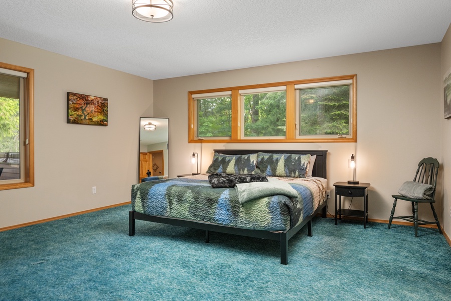 Showing you the luxurious primary bedroom at the main floor!