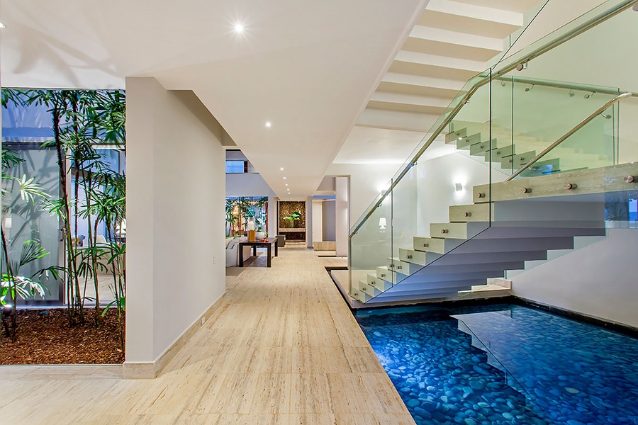 The elegant staircase leading to the suites upstairs.