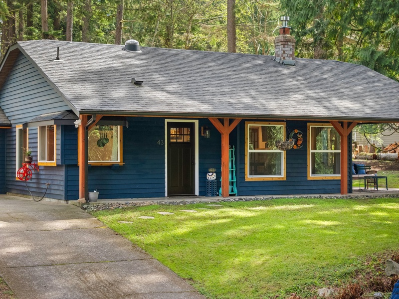 The front porch invites you to sip your coffee while soaking in the sounds of nature.