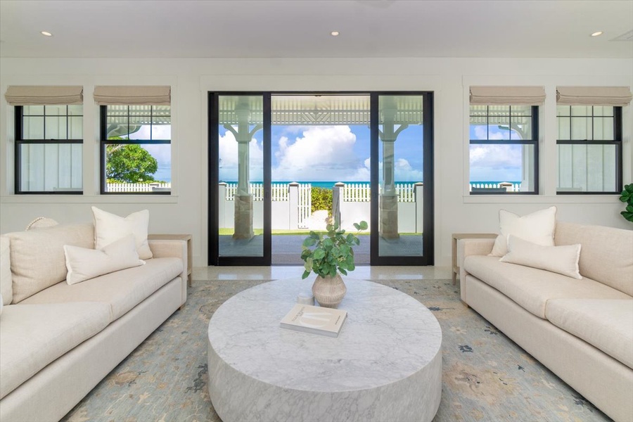 Seamless indoor-outdoor flow with views that invite you to the beachfront lanai.